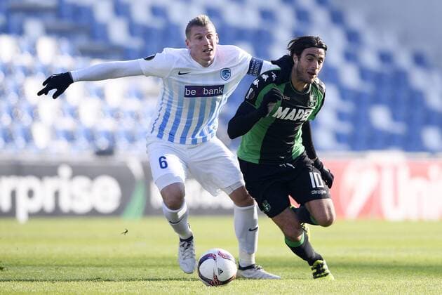 Genk s Sebastien Dewaest and Sassuolo s Alessandro Matri fight for the ball during a soccer game between Italian Club U.S. Sassuolo Calcio and Belgian team KRC Genk in Parma, Italy, Friday 09 December 2016, the sixth and last game of the group stage of the Europa League competition, in Group F. The match was scheduled for yesterday, but it was postponed due to heavy fog. YORICKxJANSENS  x04994462x