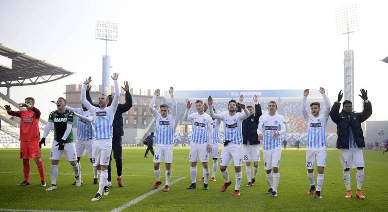 Genk s players celebrate after winning a soccer game between Italian Club U.S. Sassuolo Calcio and Belgian team KRC Genk in Parma, Italy, Friday 09 December 2016, the sixth and last game of the group stage of the Europa League competition, in Group F. The match was scheduled for yesterday, but it was postponed due to heavy fog. YORICKxJANSENS  x04994548x