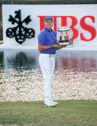 December 11, 2016 - Hong Kong, Hong Kong S.A.R, China - Final round of the 58th Hong Kong Open at The Hong Kong Golf Club Fanling, Hong Kong, Hong Kong SAR, China. Sam Brazel takes the trophy by one stroke with a birdie on the 18th. Brazel poses with the trophy by the lake on the 18th fairway Final day of the UBS Hong Kong Open Golf 2016 - ZUMAr144 20161211_zap_r144_009