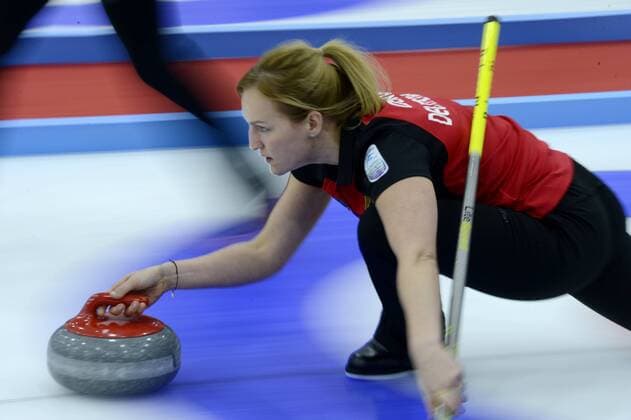(161212) -- XINING, Dec. 12, 2016 -- Josephine Obermann of Germany delivers a shot during the China Qinghai international curling competition between Canada and Germany in Xining, capital of northwest China s Qinghai Province, Dec. 11, 2016. Germany won 8-5.) (hcs) (SP)CHINA-QINGHAI-XINING-CURLING COMPETITION(CN) ZhangxHongxiang 