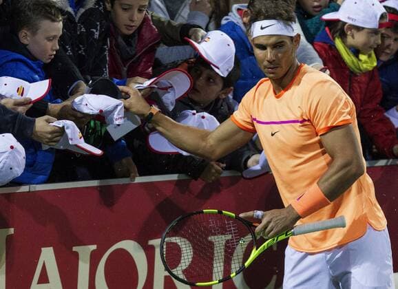 Spanish tennis player Rafa Nadal in action against Jordi Munoz and David Pere during Spain s Absolute Tennis Championship doubles final in Manacor, Balearic Islands, Spain, 17 December 2016. Nadal and his teammate Marc Lopex became won the title. EFE Cati Caldera RAFA NADAL AND MARC LOPEZ PLAY THE DOUBLES FINAL AT SPAIN S ABSOLUTE TENNIS CHAMPIONSHIP IN MANACOR !ACHTUNG: NUR REDAKTIONELLE NUTZUNG!  BAL001 20161217-636176038847636232