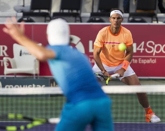 Spanish tennis player Rafa Nadal in action against Jordi Munoz and David Pere during Spain s Absolute Tennis Championship doubles final in Manacor, Balearic Islands, Spain, 17 December 2016. Nadal and his teammate Marc Lopex became won the title. EFE Cati Caldera RAFA NADAL AND MARC LOPEZ PLAY THE DOUBLES FINAL AT SPAIN S ABSOLUTE TENNIS CHAMPIONSHIP IN MANACOR !ACHTUNG: NUR REDAKTIONELLE NUTZUNG!  BAL001 20161217-636176039500656418