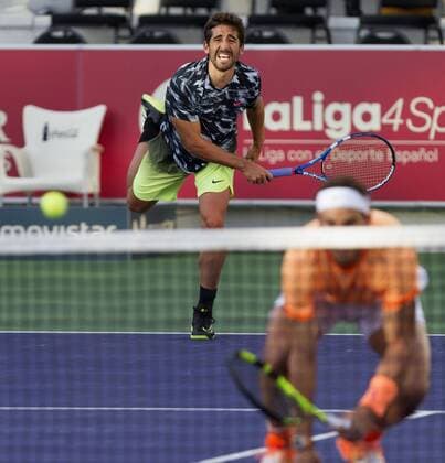 Spanish tennis players Marc Lopez (L) and Rafa Nadal (R) in action against Jordi Munoz and David Pere during Spain s Absolute Tennis Championship doubles final in Manacor, Balearic Islands, Spain, 17 December 2016. Nadal and his teammate Marc Lopex became won the title. EFE Cati Caldera RAFA NADAL AND MARC LOPEZ PLAY THE DOUBLES FINAL AT SPAIN S ABSOLUTE TENNIS CHAMPIONSHIP IN MANACOR !ACHTUNG: NUR REDAKTIONELLE NUTZUNG!  BAL001 20161217-636176040720584238