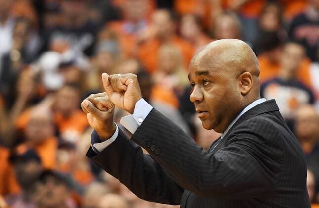 December 17, 2016: Georgetown head coach John Thompson III sends in signals during the seconds half of action as Georgetown defeated Syracuse 78-71 in men s basketball at the Carrier Dome in Syracuse, NY. Photo by Cal Media NCAA College League USA Basketball: Georgetown vs Syracuse DEC 17 - ZUMAc04_ 20161217_zaf_c04_106