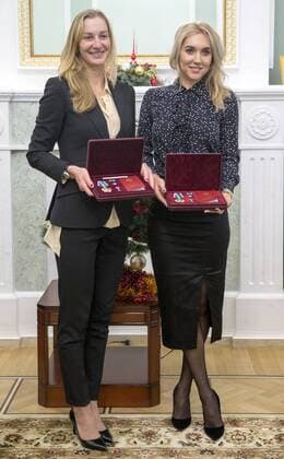 MOSCOW, RUSSIA - DECEMBER 26, 2016: Russian tennis players Ekaterina Makarova (L) and Elena Vesnina at an award ceremony at the offices of the Russian Sports Ministry. Russian tennis players Elena Vesnina and Ekaterina Makarova are awarded for their victory in the women s doubles tennis event at the 2016 Summer Olympic Games Olympische Spiele Olympia OS in Rio de Janeiro, Brazil. Vladimir Gerdo TASS  TS03CC9E