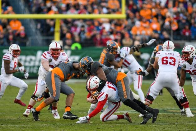 December 30, 2016: Ryker Fyfe 17 getting sacked in the game between the Nebraska Cornhuskers and the Tennessee Volunteers in the Franklin American Mortgage Music City Bowl at Nissan Stadium in Nashville, TN. Thomas McEwen CSM NCAA College League USA Football 2016: Franklin American Mortgage Music City Bowl Nebraska vs Tennessee DEC 30 - ZUMAc04_ 20161230_zaf_c04_069