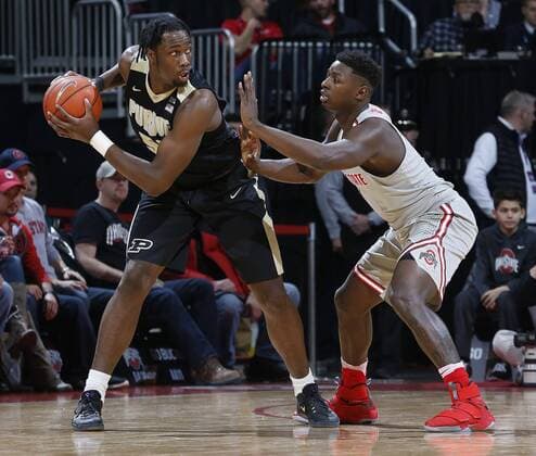 January 5, 2017 - Columbus, OH, USA - Purdue s Caleb Swanigan, left, looks for a passing lane against Ohio State s Jae Sean Tate in the first half at Nationwide Arena in Columbus, Ohio, on Thursday, Jan. 5, 2017. Purdue at Ohio State - ZUMAm67_ 20170105_zaf_m67_008