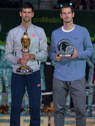 (170108) -- DOHA, Jan. 8, 2017 -- Novak Djokovic (L) of Serbia and Andy Murray of Britain pose after the awarding ceremony for the men s singles event of the Qatar ATP Tennis Herren Open tennis tournament at the Khalifa International Tennis Complex in Doha, capital of Qatar, on Jan. 7, 2017. Novak Djokovic on Saturday beat Andy Murray of Britain 2-1 in the final to claim the title. ) (SP)QATAR-DOHA-TENNIS-ATP-QATAR OPEN Nikku 