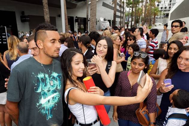 Australia: Fast 4 Tennis Showdowns Nick Kyrgios (AUS) greets fans as he arrives for the FAST4 Showdown AUS v WORLD played at the International Convention Center in Sydney. FOR EDITORIAL USE ONLY.Pacific Press Agency  HughxPeterswaldx xPacificxPress