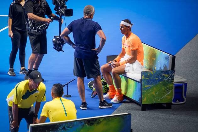 Australia: Fast 4 Tennis Showdowns Nick Kyrgios (AUS) and Rafael Nadal (WORLD) are speak to their coaches during the FAST4 Showdown AUS v WORLD played at the International Convention Center in Sydney. Nick Kyrgios defeated Rafael Nadal 4-3 2-4 4-3 4-3 FOR EDITORIAL USE ONLY.Pacific Press Agency  HughxPeterswaldx xPacificxPress