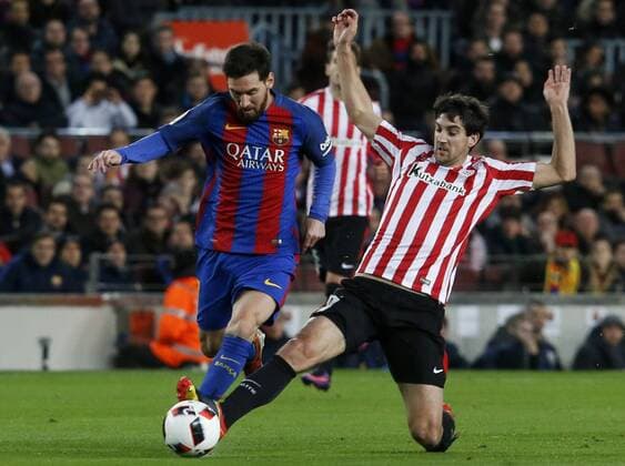 BARCELONA, Jan. 11, 2017 -- Barcelona s Lionel Messi (L) vies with Bilbao s Sabin Merino during the Spanish King s Cup soccer match FC Barcelona Barca against Athletic de Bilbao at the Camp Nou Stadium in Barcelona, Spain, Jan. 11, 2017. Barcelona won 3-1. ) (SP)SPAIN-BARCELONA-SOCCER-KING S CUP-BARCELONA VS ATHLETIC BILBAO PauxBarrena 