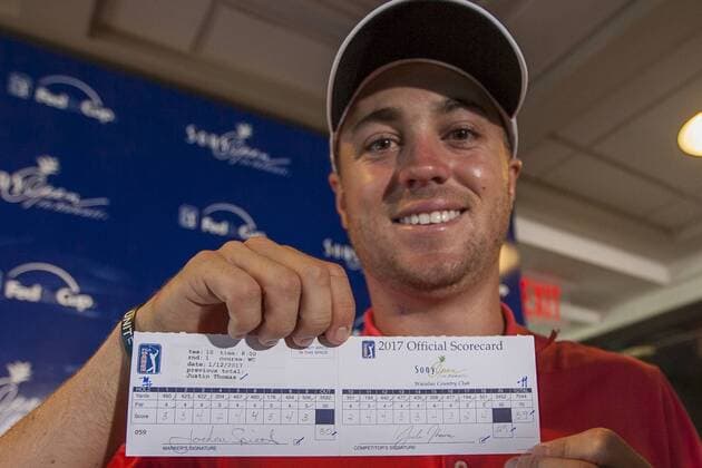 January 12, 2017 - Honolulu, Hawaii: Justin Thomas poses with his score card after shooting a score of 59 during the first round of the Sony Open at Waialae Country Club in Honolulu, Hawaii. PGA Golf Herren Golf: Sony Open JAN12 - ZUMAc04_ 20170112_zaf_c04_083