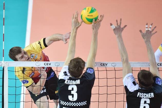 From left FILIP KRAMAR of Dukla Liberec and ROBERT KROMM, FELIX FISCHER of Berlin Recycling Volleyes in action during the Men s Volleyball Champions League 3rd round B group match: Dukla Liberec vs Berlin in Liberec, Czech Republic, January 18, 2017. (CTKxPhoto RadekxPetrasek) CTKPhotoP201701180993301  PER 6
