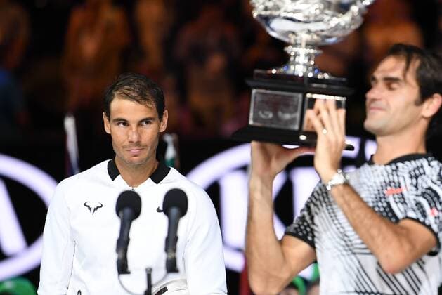 January 29, 2017: Rafael Nadal of Spain looks on as Roger Federer of Switzerland poses for photographs after winning the Men s Final on day 14 of the 2017 Australian Open Grand Slam tennis tournament in Melbourne, Australia. Cal Media Tennis 2017: Australian Open Jan 29 - ZUMAc04_ 20170129_zaf_c04_048 Copyright: xSydneyxLowx