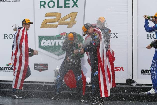January 29, 2017 - Daytona Beach, Florida, United States of America - January 29, 2017 - Daytona Beach, Florida, USA: Jeff Gordon celebrates winning the Rolex 24 at Daytona by spraying champagne with his teammates following the Rolex 24 At Daytona at Daytona International Speedway in Daytona Beach, Florida. IMSA 2017: IMSA WeatherTech SportsCar Championship Rolex 24 At Daytona January 29 - ZUMAa161 20170129_zaa_a161_106 Copyright: xJustinxR.xNoexAspxIncx