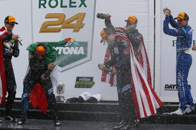 January 29, 2017 - Daytona Beach, Florida, United States of America - January 29, 2017 - Daytona Beach, Florida, USA: Jeff Gordon celebrates winning the Rolex 24 at Daytona by spraying champagne with his teammates following the Rolex 24 At Daytona at Daytona International Speedway in Daytona Beach, Florida. IMSA 2017: IMSA WeatherTech SportsCar Championship Rolex 24 At Daytona January 29 - ZUMAa161 20170129_zaa_a161_107 Copyright: xJustinxR.xNoexAspxIncx