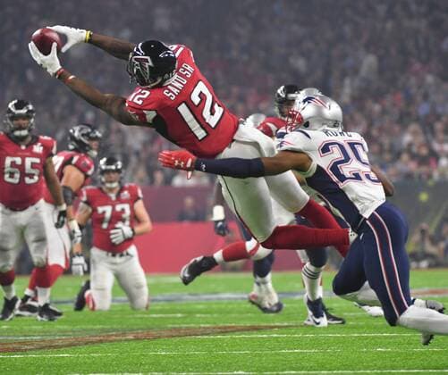 Atlanta Falcons wide receiver Mohamed Sanu catches a QB Matt Ryan pass for 13 yards against New England Patriots Eric Rowe in the third quarter of Super Bowl LI at NRG Stadium in Houston on February 5, 2017.  SBP20170205444 KEVINxDIETSCH