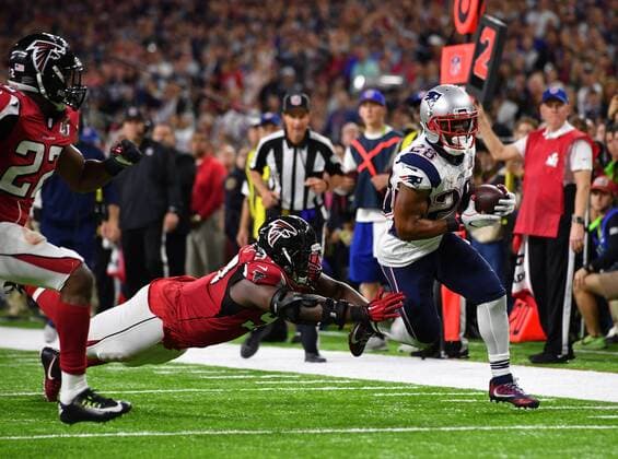 New England Patriots running back James White takes a Tom Brady pass to the Atlanta Falcons 3 yard line before the play was nullified by a penalty in the second quarter of Super Bowl LI at NRG Stadium in Houston on February 5, 2017.  SBP20170205447 KEVINxDIETSCH