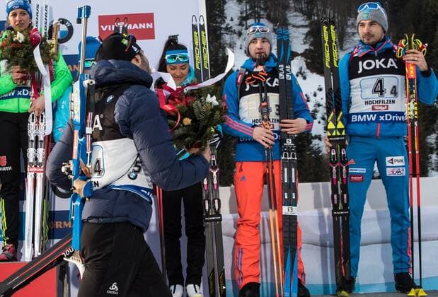 HOCHFILZEN, AUSTRIA - FEBRUARY 9, 2017: Gold medalist Vanessa Hinz of Germany, bronze medalists Olga Podchufarova, Tatyana Akimova, Alexander Loginov, Anton Shipulin of Russia (L-R back), and silver medalist Martin Fourcade of France (front) at an award ceremony for the 2 6 km + 2 7.5 km Mixed Relay event at the 2017 IBU Biathlon World Championships in Hochfilzen, Austria. Stanislav Krasilnikov TASS  TS040855