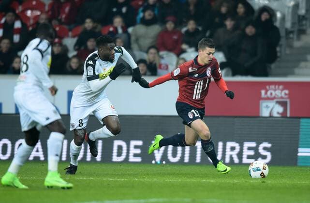 Nicolas De Preville ( Lille ) - Ismael Traore ( Angers ) FOOTBALL : Lille OSC vs SCO Angers - Ligue 1 - Lille - 11 02 2017 FedericoPestellini Panoramic 