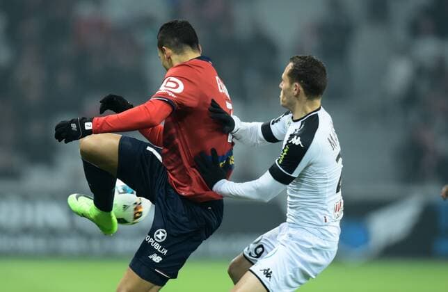 Anwar El Ghazi ( Lille ) - Vincent Manceau ( Angers ) FOOTBALL : Lille OSC vs SCO Angers - Ligue 1 - Lille - 11 02 2017 FedericoPestellini Panoramic 