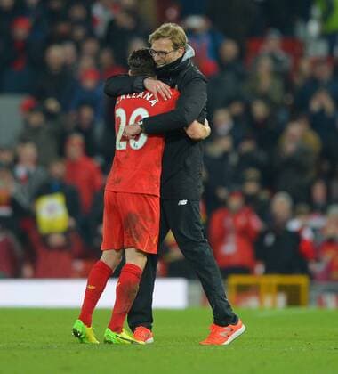 A Happy Liverpool Manager Jurgen Klopp with Adam Lallana of Liverpool at the end of the English Premier league match at Anfield Stadium, Liverpool. Picture date: February 11th, 2017. Pic Robin Parker Sportimage EDITORIAL USE ONLY. No use with unauthorised audio, video, data, fixture lists, club league logos or live services. Online in-match use limited to 120 images, no video emulation. No use in betting, games or single club league player publications.