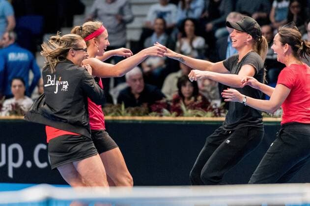 Tennis - FED Cup by BNP 2017 game between Romania and Belgium February 2017 February 12, 2017: Kristen Flipkens (BEL), Elise Mertens (BEL), Dominique Monami The team captain of Belgium and Yanina Wickmayer (BEL) during the FED Cup by BNP 2017 game between Romania and Belgium at Sala Polivalenta, Bucuresti, Romania ROU. Copyright: Cronos Catalin Soare