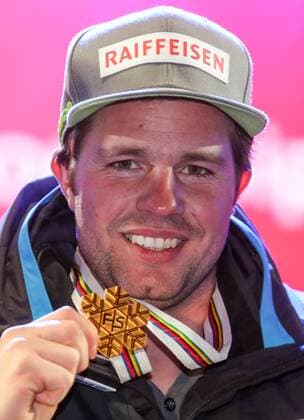 Ski Alpin, WM in St. Moritz, Siegerehrung Abfahrt der Herren ALPINE SKIING - FIS Ski WC St. Moritz SANKT MORITZ,SWITZERLAND,12.FEB.17 - ALPINE SKIING - FIS Alpine World Ski Championships, downhill, men, award ceremony. Image shows Beat Feuz (SUI). Keywords: medal. GEPAxpictures xMarioxKneisl
