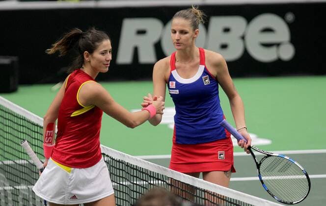 Tennis player Garbine Muguruza from Spain (left) shakes hands with Karolina Pliskova from Czech Republic, (right) during the tennis match of the Fed Cup 1st round between the Czech Republic (Karolina Pliskova) and Spain, in Ostrava, Czech Republic, February 12, 2017. (CTKxPhoto PetrxSznapka) CTKPhotoP201702120388501  SZN 21