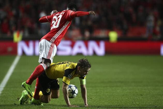 February 14, 2017 - Lisbon, Portugal - Benfica s midfielder Nelson Semedo (L) vies with Dortmund s defender Sokratis Papastathopoulos during the Champions League football match between SL Benfica and Borussia Dortmund at Luz Stadium in Lisbon on February 14, 2017. SL Benfica v Borussia Dortmund - UEFA Champions League Round of 16: First Leg  - ZUMAn230 20170214_zaa_n230_413 Copyright: xCarlosxCostax