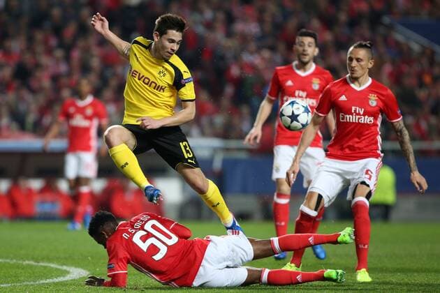 February 14, 2017 - Lisbon, Portugal - Dortmund s defender Raphael Guerreiro (L up) fights for the ball with Benfica s defender Nelson Semedo (down) during the UEFA Champions League round of 16 first leg football match SL Benfica vs Borussia Dortmund at the Luz stadium in Lisbon Portugal on February 14, 2017. Photo: UEFA Champions League round of 16 first leg football match SL Benfica vs Borussia Dortmund - ZUMAf123 20170214_zap_f123_008 Copyright: xPedroxFiuzax