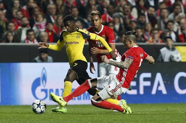 February 14, 2017 - Lisbon, Portugal - Dortmund s forward Ousmane Dembele (L) vies for the ball with Benfica s midfielder Ljubomir Fejsa (R) and Benfica s midfielder Filipe Augusto (C) during Champions League 2016 17 match between SL Benfica vs BVB Borussia Dortmund, in Lisbon, on February 14, 2017. SL Benfica v Borussia Dortmund - UEFA Champions League Round of 16: First Leg  - ZUMAn230 20170214_zaa_n230_506 Copyright: xCarlosxPalmax