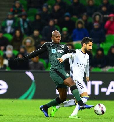 UEFA Europa League match between Krasnodar and Fenerbahce at Krasnodar Stadium in Krasnodar , Russia on February 16 , 2017. Pictured: Alper Potuk (L) of Fenerbahce and Charles Kabore of Krasnodar. 