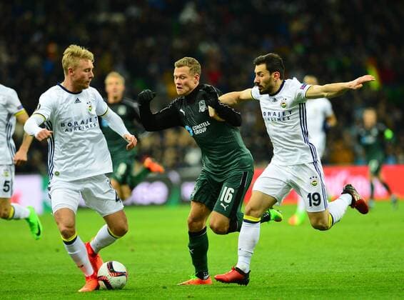 UEFA Europa League match between Krasnodar and Fenerbahce at Krasnodar Stadium in Krasnodar , Russia on February 16 , 2017. Pictured: Simon Kjaer , Sener Ozbayrakli (R) of Fenerbahce and Viktor Claesson of Krasnodar. 