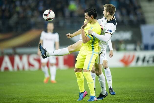 Gent s Jeremy Perbet and Tottenham s defender Eric Dier fight for the ball during a game between Belgian soccer team KAA Gent and British team Tottenham, first-leg of the 1 16 finals of the Europa League competition, Thursday 16 February 2017, in Gent. JASPERxJACOBS  x05048716x