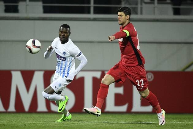 Genk s Mwbana Ally Samatta and Astra Giurgiu s Cristian Sapunaru fight for the ball during a first leg game between Romanian Club Astra Giurgiu and Belgian soccer team RC Genk in the 1 16 finals of the Europa League competition on Thursday 16 February 2017, in Giurgiu, Romania. YORICKxJANSENS  x05048734x