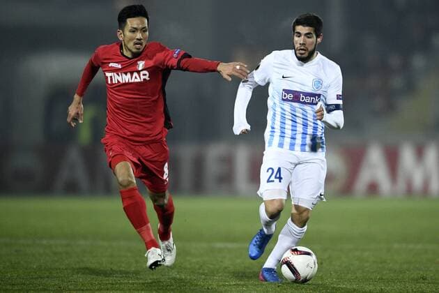 Astra Giurgiu s Seto Takayuki and Genk s Alejandro Pozuelo fight for the ball during a first leg game between Romanian Club Astra Giurgiu and Belgian soccer team RC Genk in the 1 16 finals of the Europa League competition on Thursday 16 February 2017, in Giurgiu, Romania. YORICKxJANSENS  x05048736x
