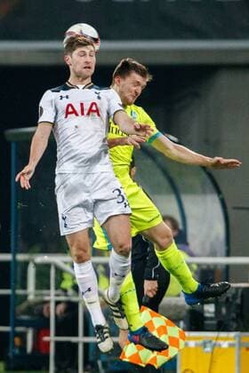Tottenham s defender Ben Davies and Gent s Thomas Foket fight for the ball during a game between Belgian soccer team KAA Gent and British team Tottenham, first-leg of the 1 16 finals of the Europa League competition, Thursday 16 February 2017, in Gent. KURTxDESPLENTER  x05048750x