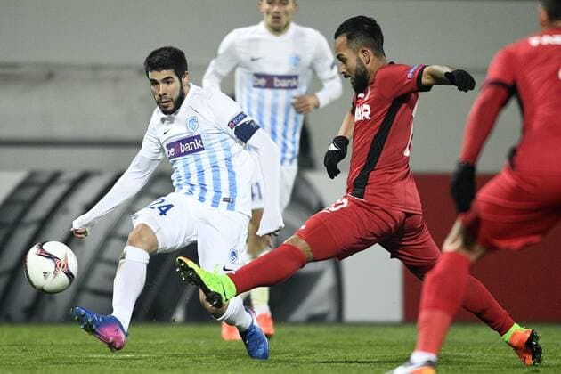 Genk s Alejandro Pozuelo and Astra Giurgiu s Junior Morais fight for the ball during a first leg game between Romanian Club Astra Giurgiu and Belgian soccer team RC Genk in the 1 16 finals of the Europa League competition on Thursday 16 February 2017, in Giurgiu, Romania. YORICKxJANSENS  x05048770x
