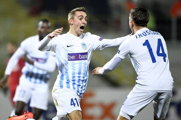 Genk s Timothy Castagne and Genk s Leandro Trossard celebrate during a first leg game between Romanian Club Astra Giurgiu and Belgian soccer team RC Genk in the 1 16 finals of the Europa League competition on Thursday 16 February 2017, in Giurgiu, Romania. YORICKxJANSENS  x05048778x