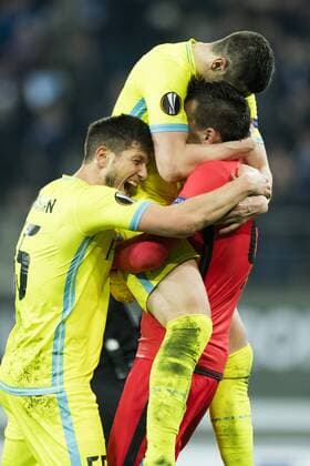 Gent s Rami Gershon, Gent s Stefan Mitrovic and Gent s goalkeeper Lovre Kalinic celebrate after winning a game between Belgian soccer team KAA Gent and British team Tottenham, first-leg of the 1 16 finals of the Europa League competition, Thursday 16 February 2017, in Gent. JASPERxJACOBS  x05048925x