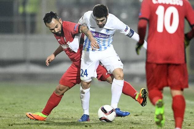 Astra Giurgiu s Junior Morais and Genk s Alejandro Pozuelo fight for the ball during a first leg game between Romanian Club Astra Giurgiu and Belgian soccer team RC Genk in the 1 16 finals of the Europa League competition Thursday 16 February 2017, in Giurgiu, Romania. YORICKxJANSENS  x05049032x