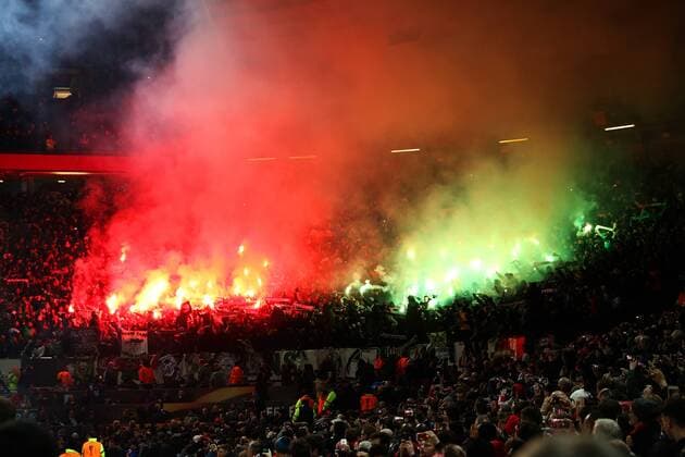Saint-Etienne fans let off fireworks during the UEFA Europa League Round of 32 1st leg match at Old Trafford Stadium, Manchester. Picture date: February 16th, 2017. Pic credit should read: Matt McNulty Sportimage EDITORIAL USE ONLY. No use with unauthorised audio, video, data, fixture lists, club league logos or live services. Online in-match use limited to 120 images, no video emulation. No use in betting, games or single club league player publications.
