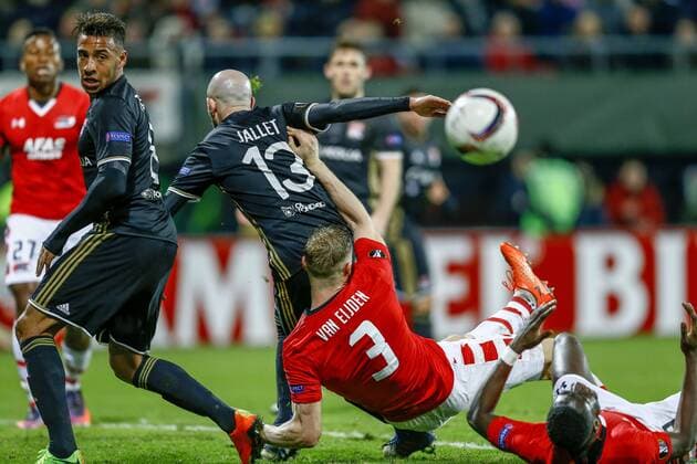 (l-r) Corentin Tolisso of Olympique Lyon, Christophe Jallet of Olympique Lyon, Rens van Eijden of AZ Alkmaar, Derrick Luckassen of AZ Alkmaarduring the UEFA Europa League round of 32 match between AZ Alkmaar and Olympique Lyonnais on February 16, 2017 at the AFAS stadium in Alkmaar, The Netherlands. AZ v Olympique Lyon UEFA Europa League 2016 2017 xVIxxIVx 7132878