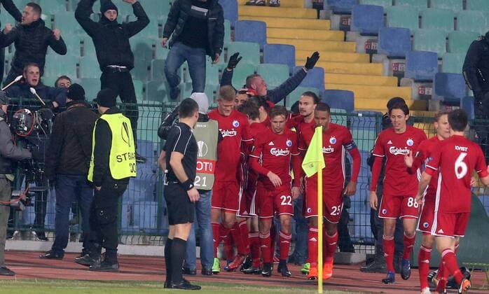16.02.2017 Sofia(Bulgaria) PFC Ludogorets-FC Kobenhavn(FC Copenhagen) Europa League men s football FC Kobenhavn(FC Copenhagen) players Andreas Cornelius(central front left), Peter Ankersen(C 2ndL),Mathias Jorgensen(C4thL) and Uros Matic(R) celebrate with their fans second goal on match :Str 