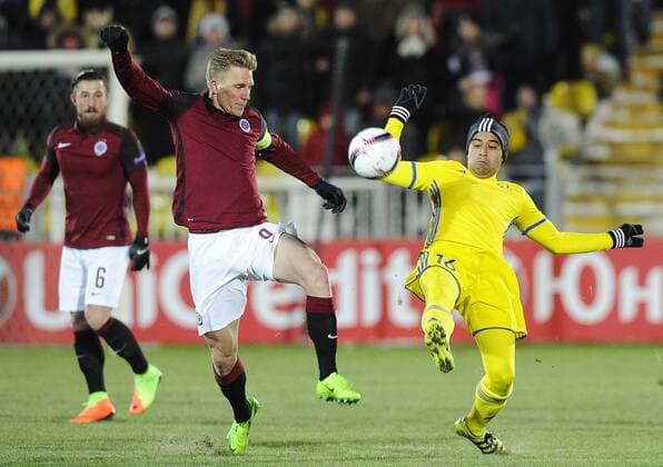ROSTOV-ON-DON, RUSSIA - FEBRUARY 16, 2017: AC Sparta Pragueâ€™s Borek Dockal (L) and FC Rostovâ€™s Christian Noboa fight for the ball in their 2016-17 UEFA Europa League Round of 32, 1st leg football match at Olimp 2 Stadium. FC Rostov won the game 4-0. Valery Matytsin TASS  TS041773