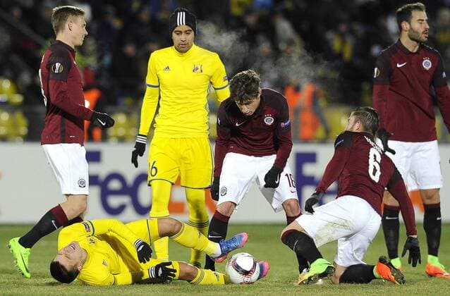 ROSTOV-ON-DON, RUSSIA - FEBRUARY 16, 2017: FC Rostovâ€™s Dmitri Poloz, Christian Noboa, AC Sparta Pragueâ€™s Michal Sacek, Lukas Vacha (L-R) in their 2016-17 UEFA Europa League Round of 32, 1st leg football match at Olimp 2 Stadium. FC Rostov won the game 4-0. Valery Matytsin TASS  TS041784