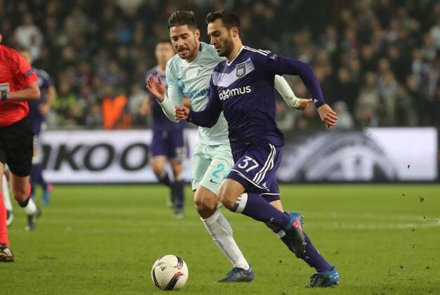 Anderlecht s Ivan Obradovic and Zenit s defender Aleksandr Anyukov fight for the ball during a game between Belgian soccer team RSC Anderlecht and Russian team FC Zenit, first-leg of the 1 16 finals of the Europa League competition, Thursday 16 February 2017, in Brussels. VIRGINIExLEFOUR  x05049114x