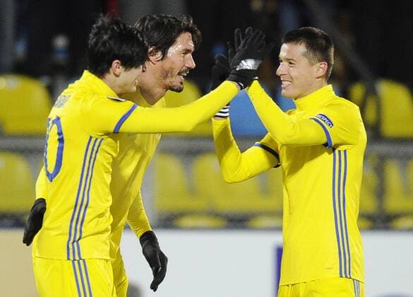 ROSTOV-ON-DON, RUSSIA - FEBRUARY 16, 2017: FC Rostovâ€™s Sardar Azmoun, Cesar Navas, and Dmitri Poloz (L-R) celebrate scoring in their 2016-17 UEFA Europa League Round of 32, 1st leg football match against AC Sparta Prague at Olimp 2 Stadium. FC Rostov won the game 4-0. Valery Matytsin TASS  TS041793