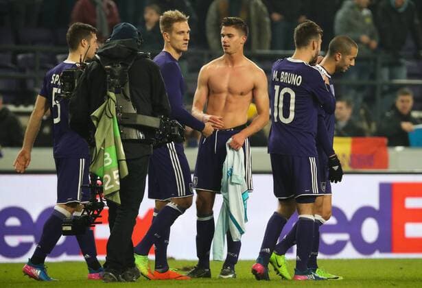 Anderlecht s Massimo Bruno and Anderlecht s Leander Dendoncker celebrate after winning a game between Belgian soccer team RSC Anderlecht and Russian team FC Zenit, first-leg of the 1 16 finals of the Europa League competition, Thursday 16 February 2017, in Brussels. VIRGINIExLEFOUR  x05049158x